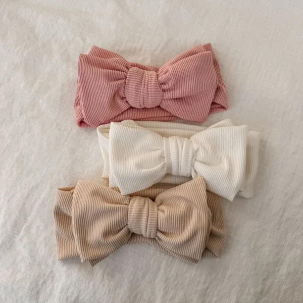 Soft cotton baby headband in pink, white and beige - comfortable and gentle on baby's skin